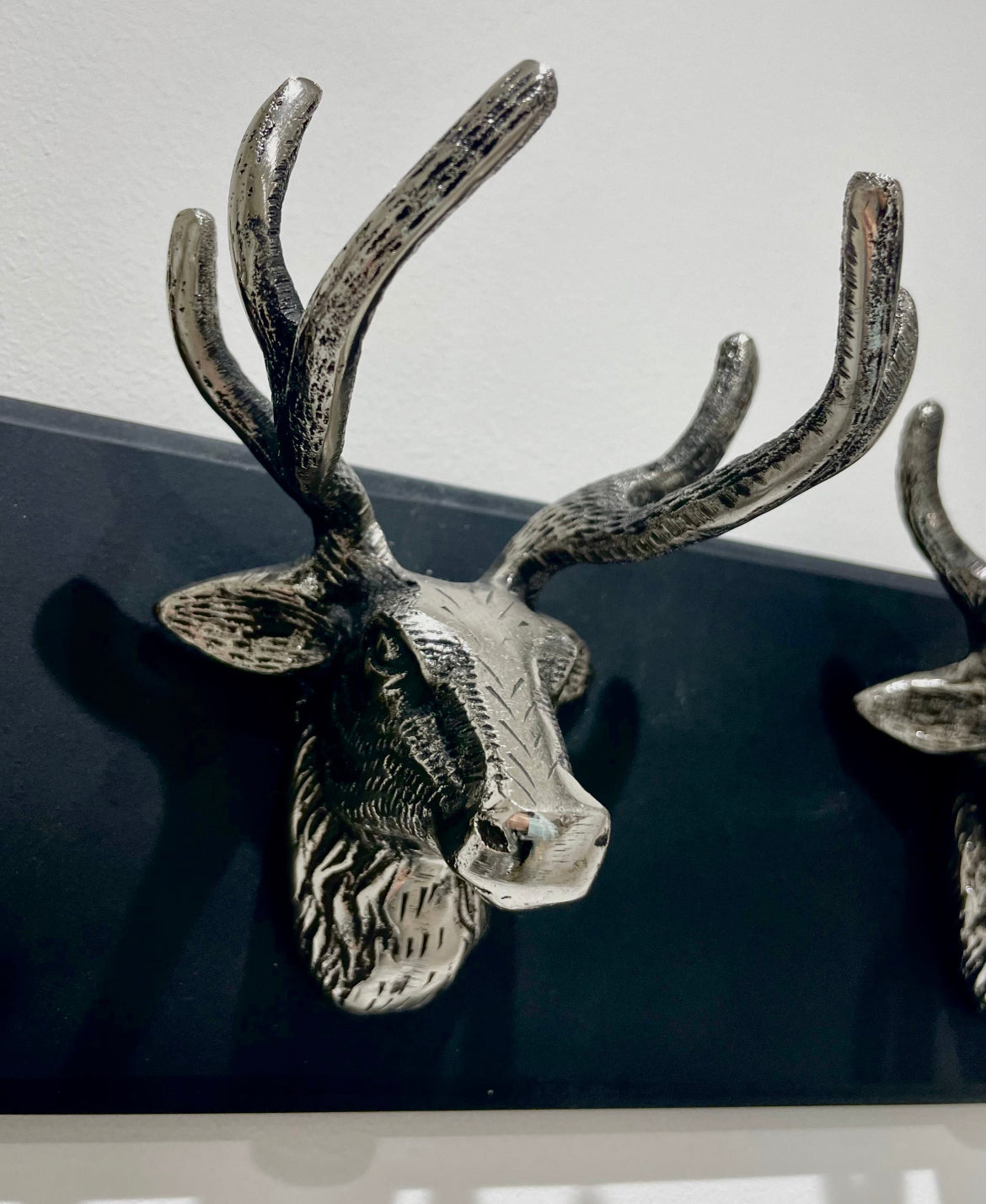 Three Silver Stag Head Wall Hooks on Black Board – Chic Interiors